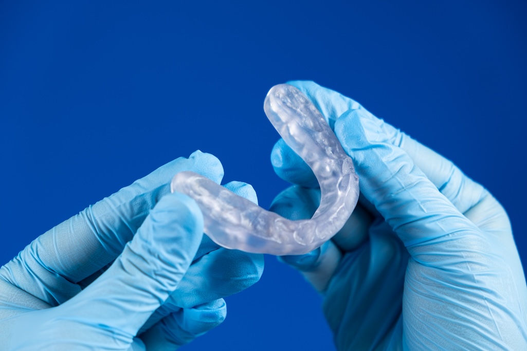 custom nightguards, teeth grinding, TMJ disorders, jaw pain, improved sleep quality, dental care solutions